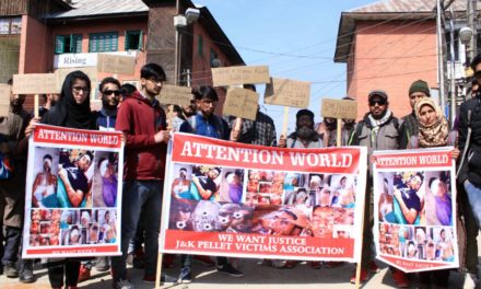 Pellet victims held protest says need no compensation from govt or sympathies from Separatists.