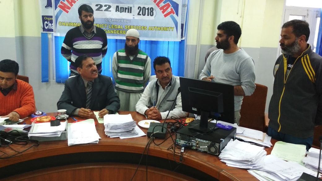 National Lok Adalat held at District Court Ganderbal & Minsiff Court Kangan, 607 cases were taken up in which 381 cases disposed off