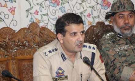 Senior Superintendent of Police Ganderbal greets people on Eid-ul-Azha
