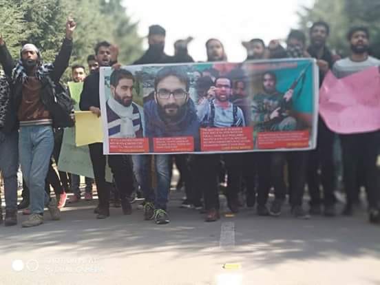Kashmir University students march in solidarity with AMU students