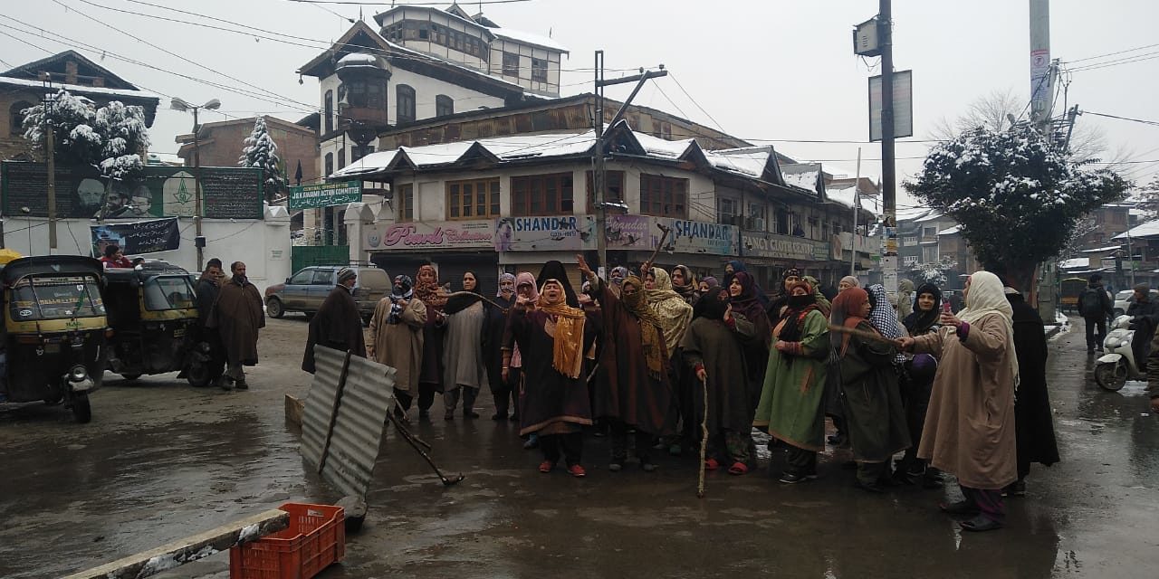 Women protest in downtown Srinagar to demand release of jailed kin