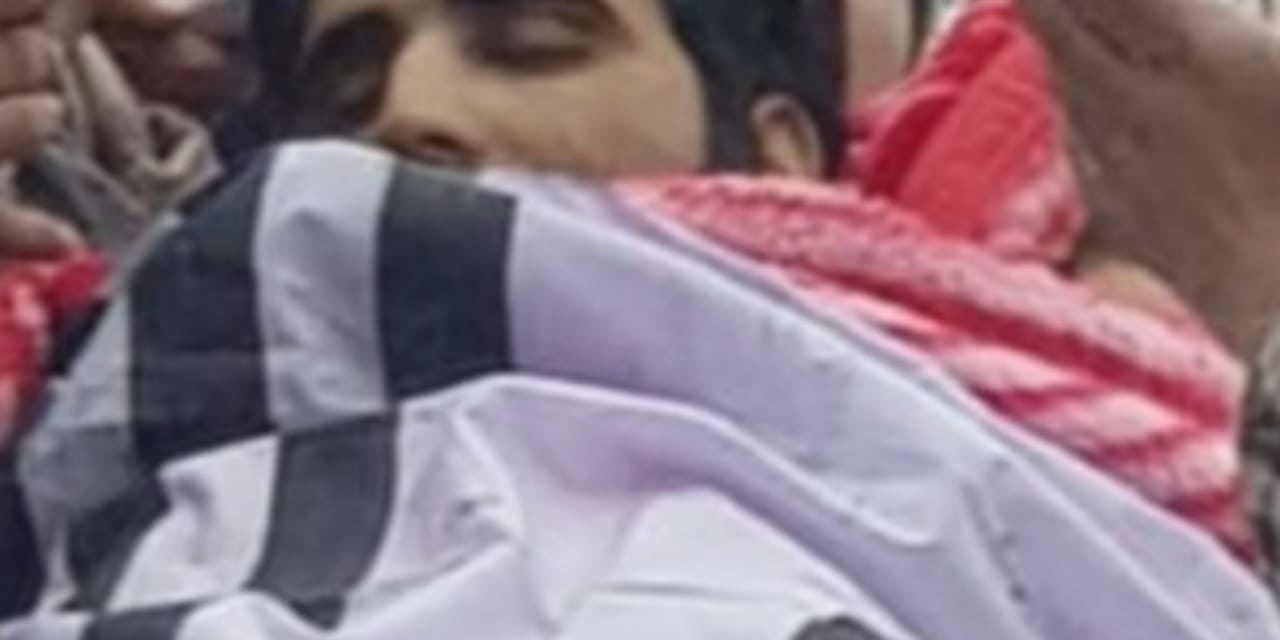 Amid tears, sobs, thousands participate in last rites of slain JeM millitant.