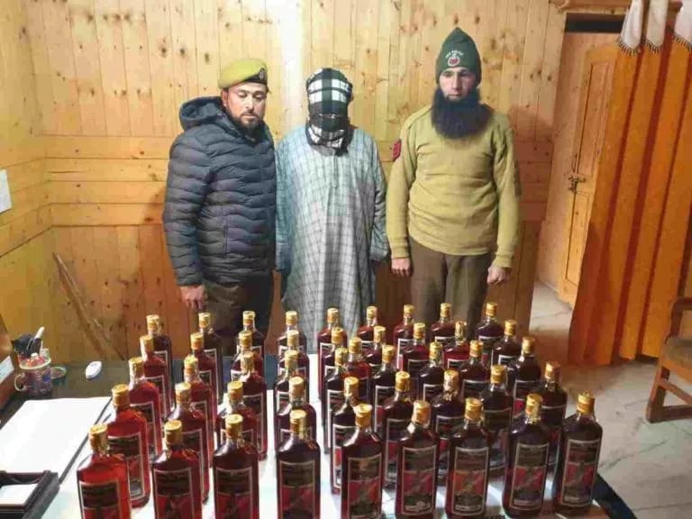 ﻿Bootlegger Held With 70 Bottles Of Illicit Liquor In Phalgam
