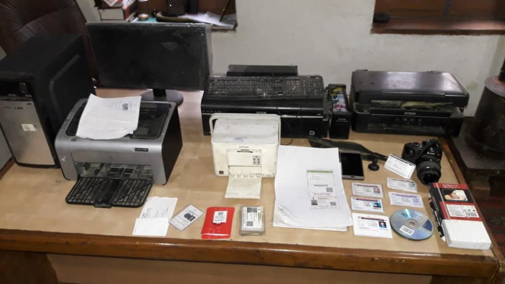 Sopore Police arrests one person for selling of fake driving licences, aadhar cards