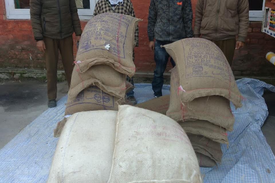 Kulgam Police seized 12 Bags of Govt Rice and 06 Bags of Govt Flour meant for black Marketing and arrested two persons