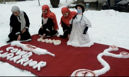 Sisters from Kashmir make snow sculpture as tribute to corona warriors