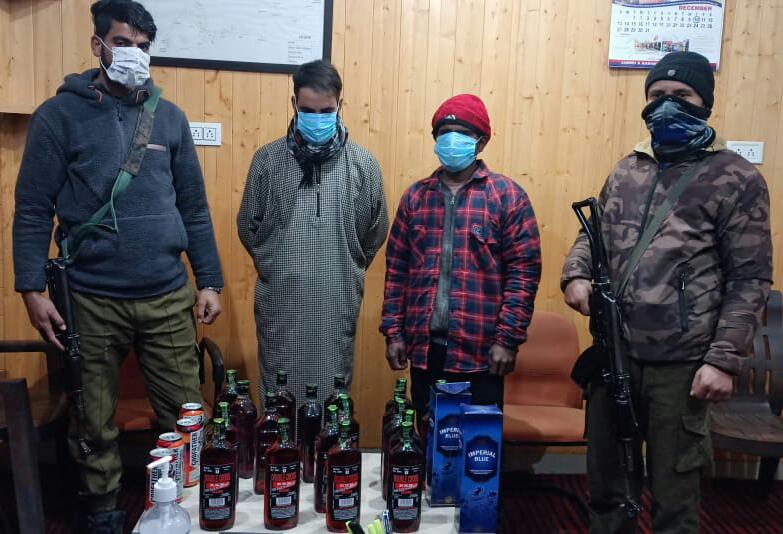 Ganderbal Police arrested two bootleggers with 30 bottles of liquor
