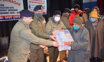 Srinagar police distributes Covid-19 safety kits among poor and needy families