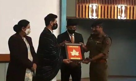 ASP Ganderbal Firoz Yehya receiving real heroes award at SKICC Srinagar