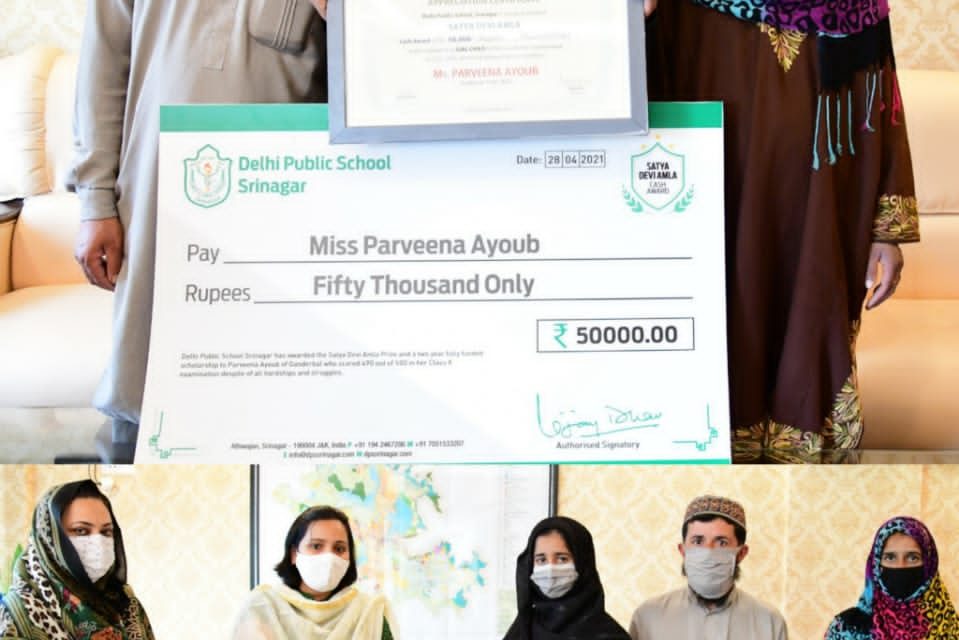 DC Gbl hands over cash prize, merit certificate to  meritorious girl