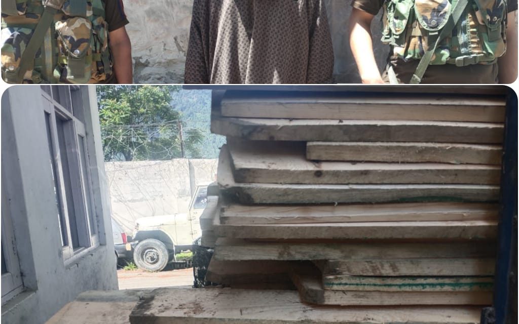 Ganderbal Police seized illicit timber,smuggler arrested in Kangan