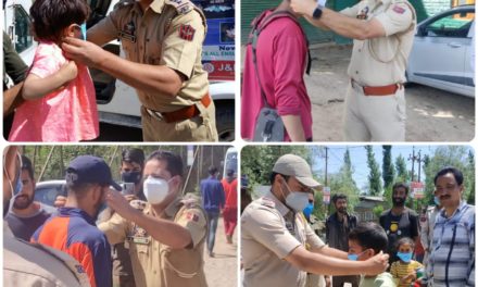 Ganderbal Police distributed face masks among needy people