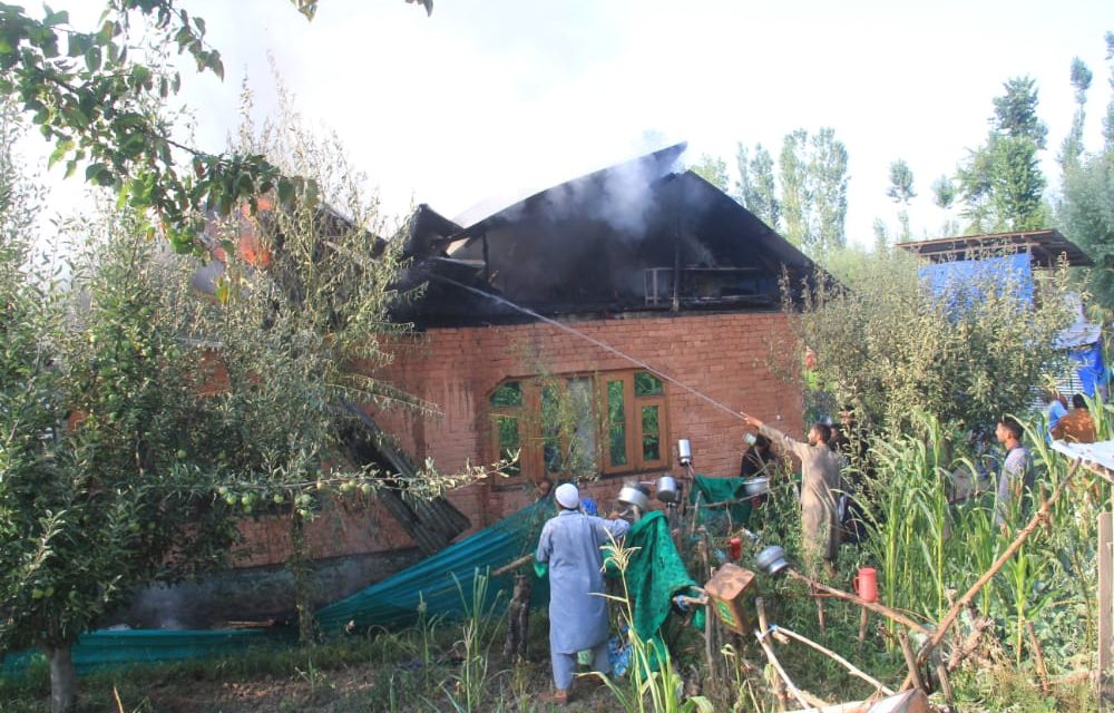 RESidential house abode to three families, damaged in blaze in tangmarg.
