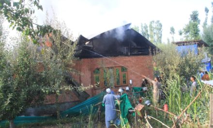 RESidential house abode to three families, damaged in blaze in tangmarg.