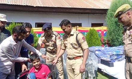 Ganderbal Police distributes wheel chairs among specially-abled persons and stationary items among needy students