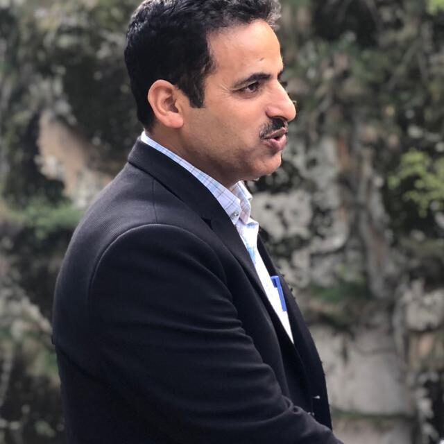 Executive Engineer PMGSY Ganderbal greets people on Eid-Ul-Adha