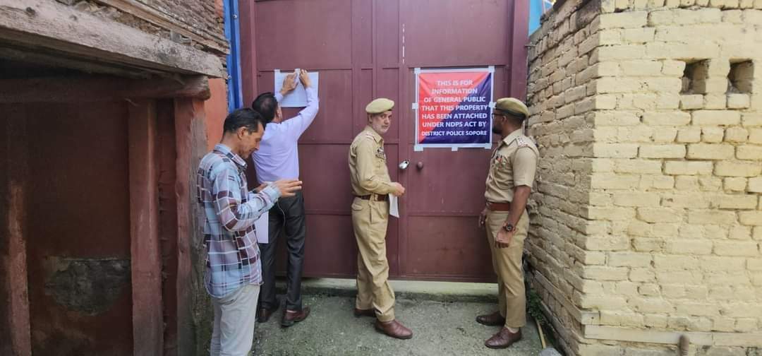 In a first, Police attaches property of drug peddler in Sopore town