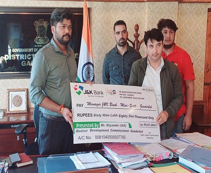 ALC presents Rs 69.81 lakh cheque to DDC Gbl for disbursement among registered construction workers