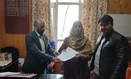 Financial assistance handed-over to beneficiaries of JKBOCWWB at Ganderbal