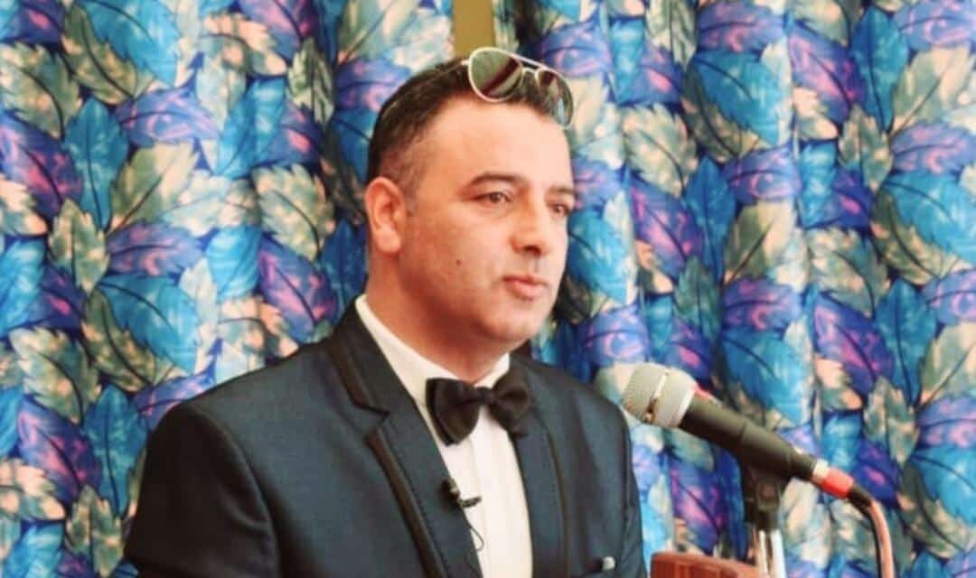 Former BJP District President and Senior Leader Gh Hassan Rather greets people on the eve of Eid-ul-Fitr