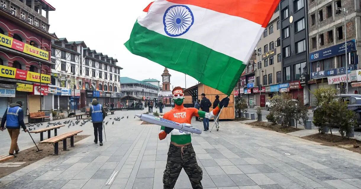 Tourist paints himself in Tricolour as he marks 77th Republic Day at Srinagar’s Lal Chowk