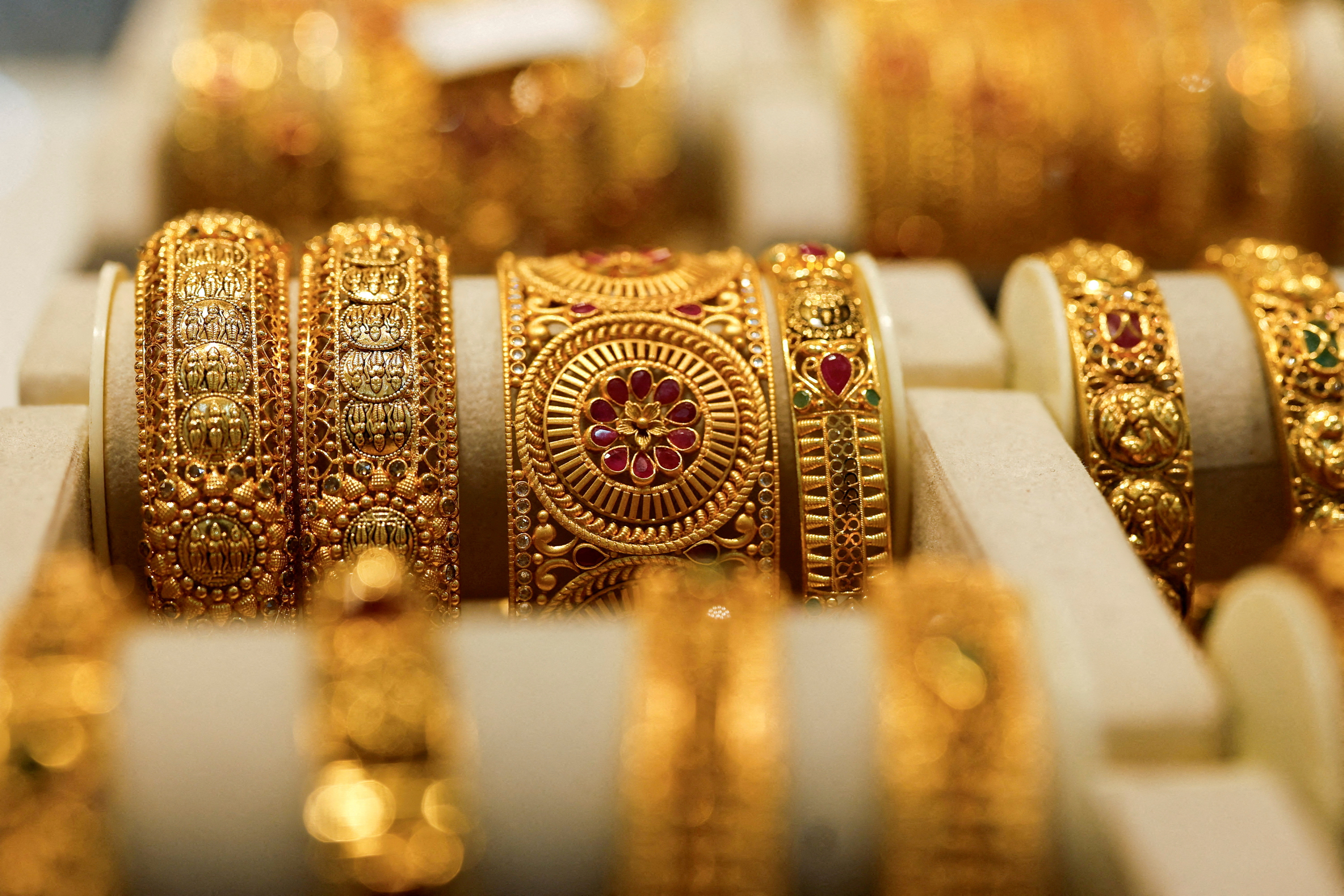 Gold breaches Rs 1.5 lakh/10g-mark; silver surges to record Rs 3.23 lakh/kg